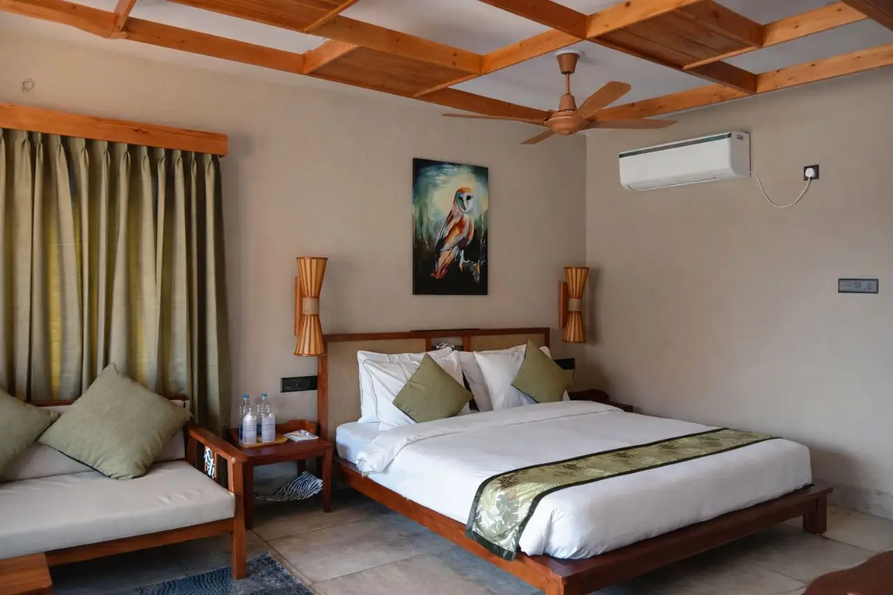 Luxury bedroom at Hotel Sonar Bangla Sundarban with AC interior and modern amenities.